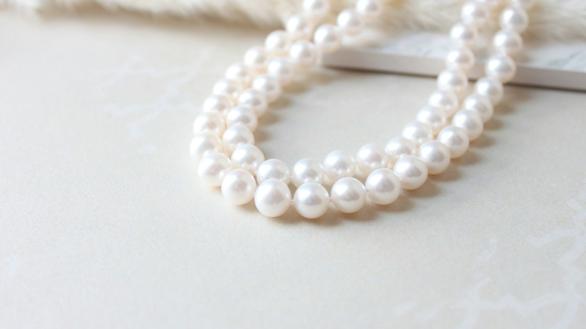 Close-up of a white pearl strand necklace