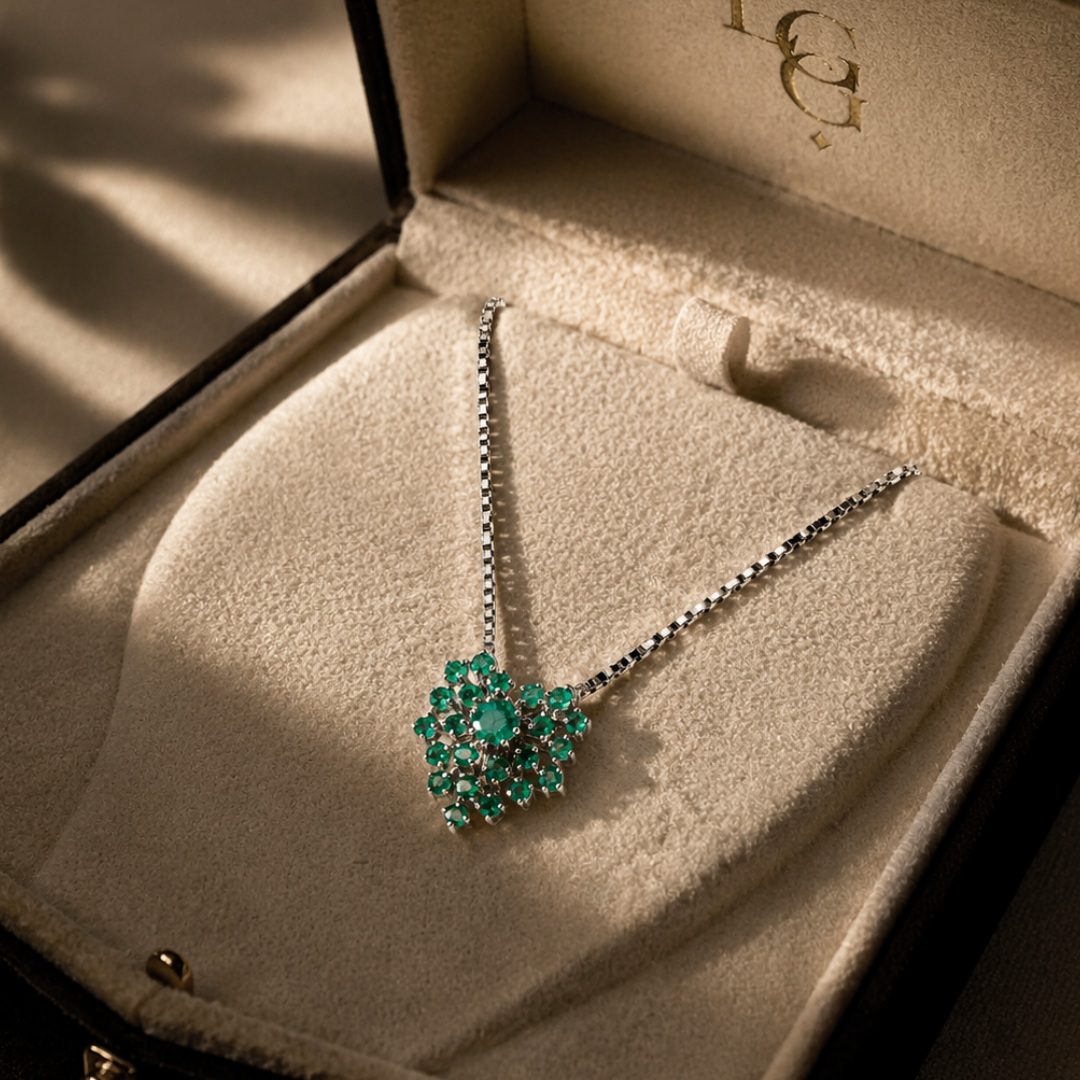 Middleton emerald heart necklace in an open jewelry box
